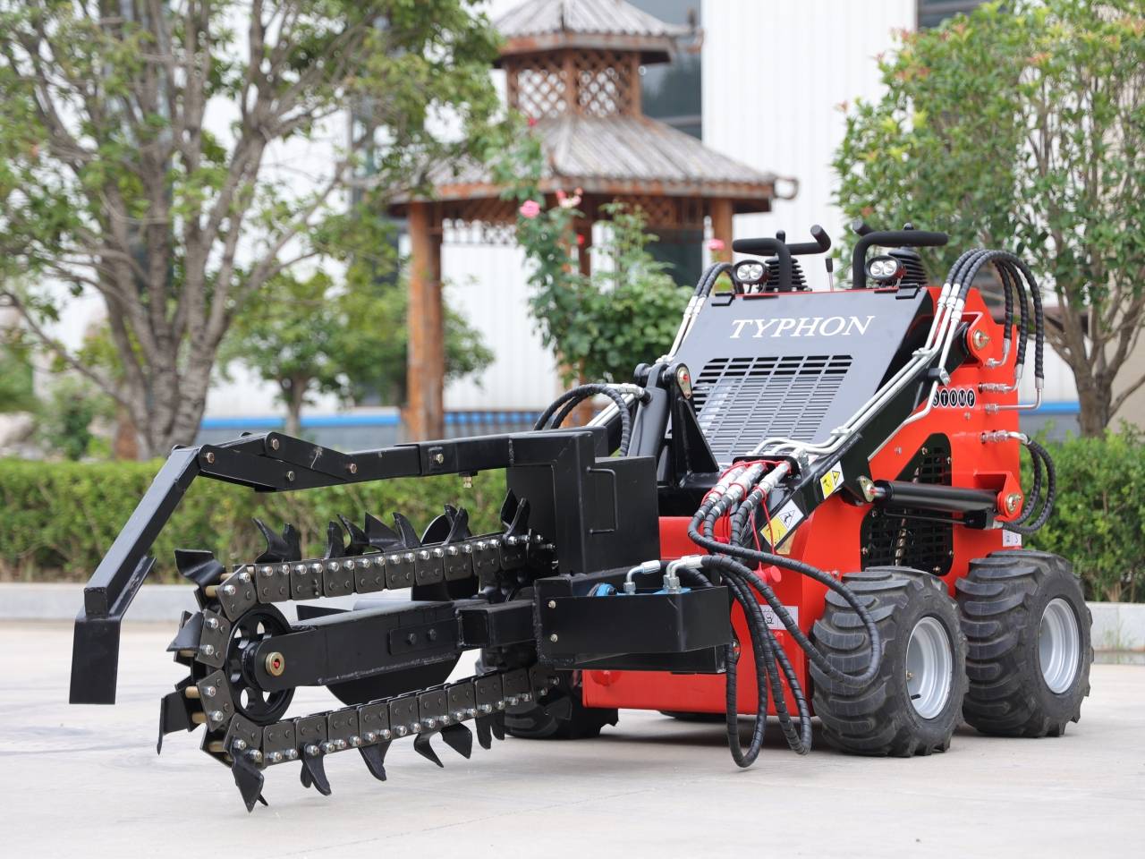 The TYPHON Skid Steer Loader Trencher Attachment is a type of excavating equipment that can be attached to a skid steer loader to dig trenches for various purposes. Maximum trenching depth: 800mm Single furrowing width: 155mm Chain speed：154m/min Weight: 177kg Dimension:1545 X1010 X875mm