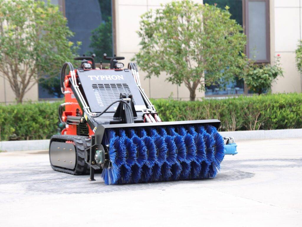 Sweeper attachment for skid steer